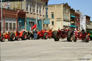 Parade of antique tractors on display on Main Street.